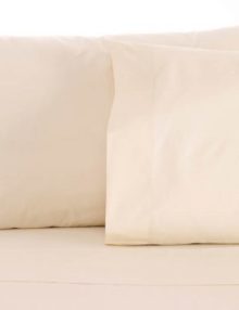 Two pillows on Sleep and Beyond Organic Sheets in white