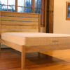 Esmont natural platform bed in linseed