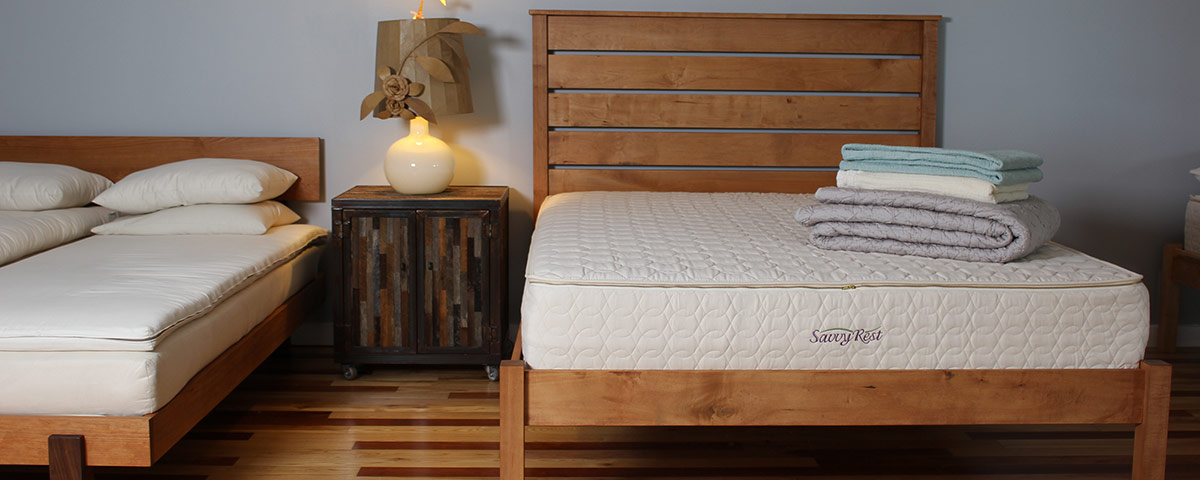 Stack of Coyuchi Blankets on Savvy Rest Mattress